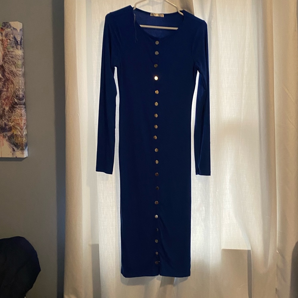 Classy, sexy and simply flattering! Cobalt blue dress with silver button details